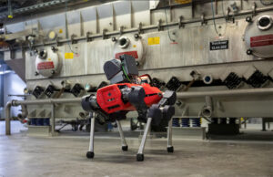 ANYmal, shown here in an industrial facility, can carry modular sensor payloads and detect machine noises and gas leaks, says ANYbotics.