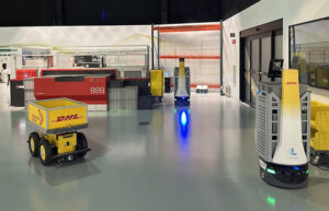 DHL displays different robots at its Experience Center in Illinois. Experts will discuss the future of warehouse automation in a free webinar.