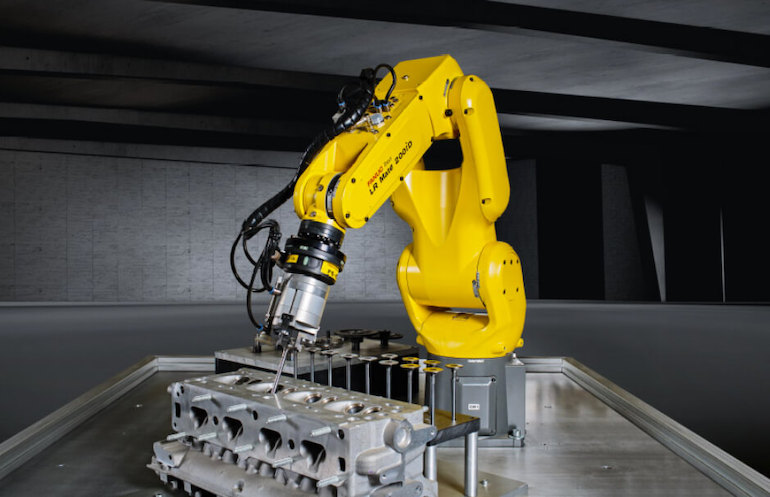 The FANUC LR Mate 200iD industrial robot arm, shown here, includes miniaturized components for agility.